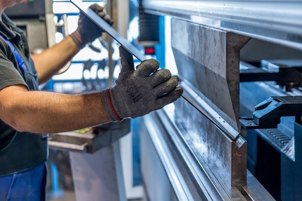 A Senior Employee Working In A Steel Industrial Sector.